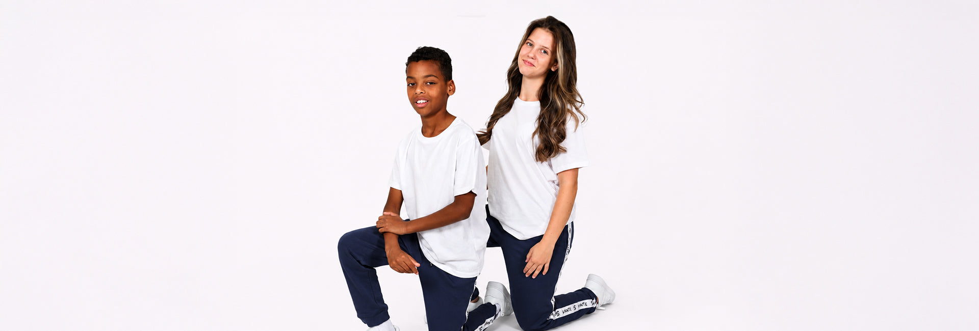 girl and boy wearing grey Svante hoody and joggers made from regenerative cotton